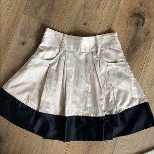 Pleated tan and black skirt